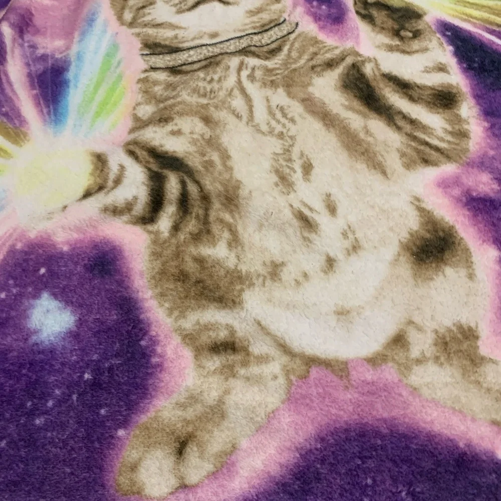 Throw blanket with cat on it